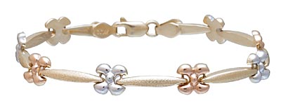 Flower bracelet in tri color gold.